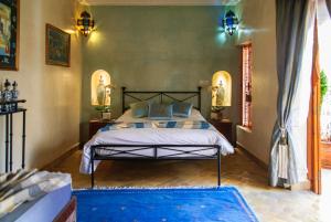 Postel nebo postele na pokoji v ubytování Riad Couleurs du Sud + 37 fotografií