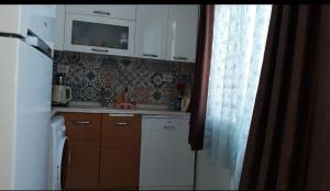 A kitchen or kitchenette at Zübeyde Hanım Homes
