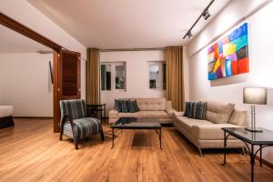 Posezení v ubytování El Polo Apart Hotel & Suites