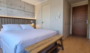 Postel nebo postele na pokoji v ubytování Apart Hotel Las Terrazas Suite