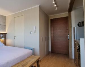 Postel nebo postele na pokoji v ubytování Apart Hotel Las Terrazas Suite