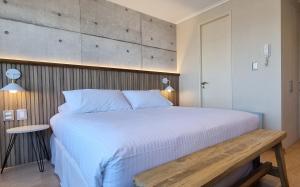 Postel nebo postele na pokoji v ubytování Apart Hotel Las Terrazas Suite