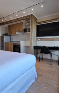 Kuchyň nebo kuchyňský kout v ubytování Apart Hotel Las Terrazas Suite