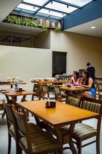 A restaurant or other place to eat at Hotel Vila Catavento