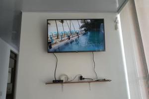 Telewizja i/lub zestaw kina domowego w obiekcie Excelente Apartamento en Girardot