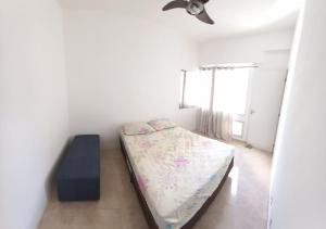 Postel nebo postele na pokoji v ubytování Apartamento para Temporada em Cabo Frio - Excelente Localização no Bairro Parque Riviera!