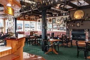 A restaurant or other place to eat at Rutland Arms Inn