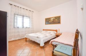 Postel nebo postele na pokoji v ubytování Apartments Studenac