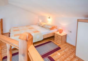 Postel nebo postele na pokoji v ubytování Apartments Studenac