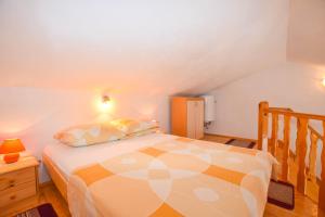 Postel nebo postele na pokoji v ubytování Apartments Studenac