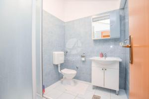 Koupelna v ubytování Apartments Studenac