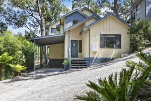 a house on the side of a road at Hidden Gem in Lorne