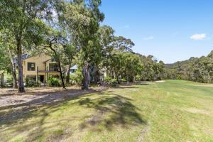 a view of the house from the fairway of the golf green at Hidden Gem in Lorne