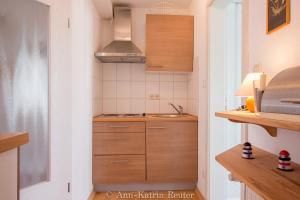 Küche/Küchenzeile in der Unterkunft Ferienhaus Am Ufer - Ferienwohnung Strandluft