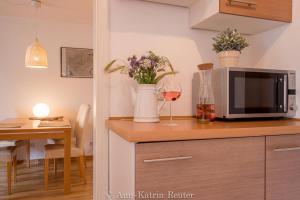 Küche/Küchenzeile in der Unterkunft Ferienhaus Am Ufer - Ferienwohnung Strandluft