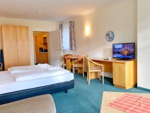 Postel nebo postele na pokoji v ubytování Sassnitz - Villa Anna Villa Anna App 10