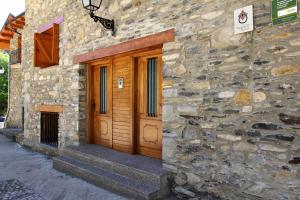 Afbeelding uit fotogalerij van Apartamentos Chuanon in Sahun +22 foto's