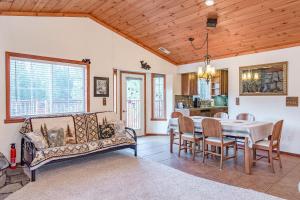 a living room with a couch and a table at Northwoods Paradise in Truckee