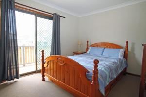 A bed or beds in a room at Perfect family holiday