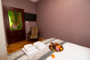 TV a/nebo společenská místnost v ubytování Maya's Flats & Resorts 45 - Dluga 18/19