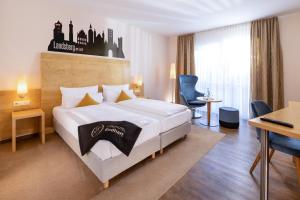 Ένα ή περισσότερα κρεβάτια σε δωμάτιο στο Landhotel Endhart