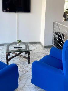 TV a/nebo společenská místnost v ubytování HOTEL FLYING