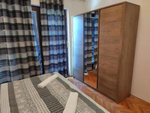 Postel nebo postele na pokoji v ubytování Apartman Ana
