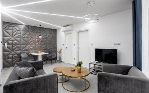Area tempat duduk di Avand Apartments Debrecen