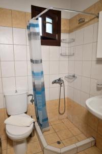 Phòng tắm tại Artemis Apartments
