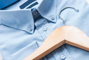 a blue shirt with a wooden hanger on it at Holiday Inn Melbourne Airport, an IHG Hotel in Melbourne
