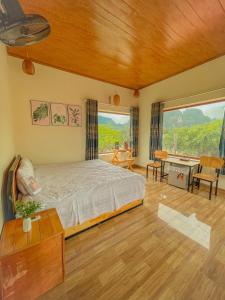 Ένα ή περισσότερα κρεβάτια σε δωμάτιο στο Cosiana Homestay +80 φωτογραφίες