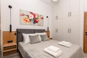 Posteľ alebo postele v izbe v ubytovaní Rikanthos Stone Sea View Apartment Ι