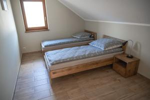 Posteľ alebo postele v izbe v ubytovaní Camping Bartbo