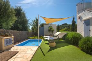 The swimming pool at or close to Casa Azul Stylish beach house for 4 adults and 1 child in Cala Llombards