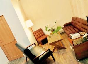 Posezení v ubytování L'AtelieR Guest House Yonago