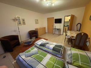 Zona de estar de Schönes einfaches Zimmer in Oldenburg