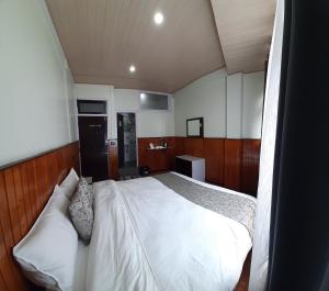 Postel nebo postele na pokoji v ubytování Kanari B&B