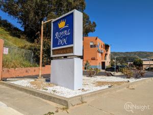 a sign for a royal egg on the side of a street at Royal Inn in South San Francisco