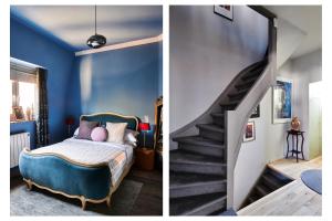 a bedroom with blue walls and a bed with a staircase at Design family 2-Bedroom House & Garden in Brussels