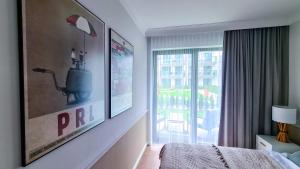 Posteľ alebo postele v izbe v ubytovaní NA WYDMIE APARTAMENT - Rezydencja Niechorze 111