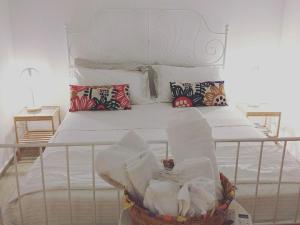 A bed or beds in a room at Terrazza Sui Sassi