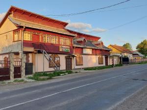 an old building on the side of a street at Lotus in Suceava