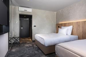 Ліжко або ліжка в номері OREA Congress Hotel Brno