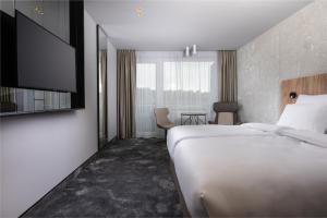 Ліжко або ліжка в номері OREA Congress Hotel Brno