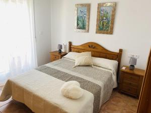 Postel nebo postele na pokoji v ubytování Anacasa Bullent Playa Rabdells AP361 + 16 fotografií