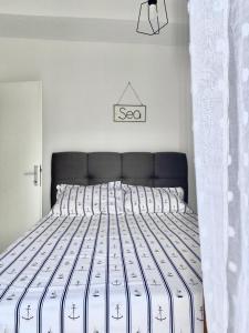 Postel nebo postele na pokoji v ubytování Apartmani Tolić