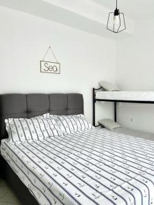 Postel nebo postele na pokoji v ubytování Apartmani Tolić