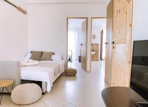 Postel nebo postele na pokoji v ubytování Apartmani Tolić