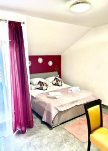 Postel nebo postele na pokoji v ubytování Residence Antiqua Rooms