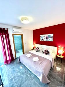 Postel nebo postele na pokoji v ubytování Residence Antiqua Rooms